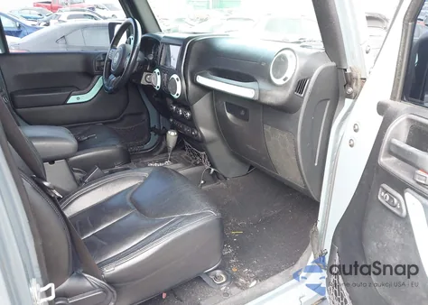 2015 Jeep Wrangler Unlimited Sahara z USA, uszkodzony, nr VIN 1C4BJWEG6FL678886